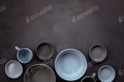 Preview: Top view of modern trendy plates in bleu and grey colors. Minimalistic Flat lay with tableware