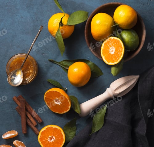 Preview: tangerine in basket dark blackground