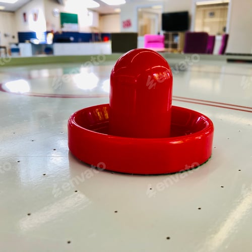 Preview: Air hockey game table with red striker