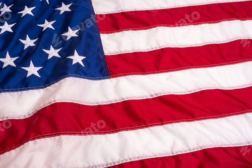 Preview: The United States flag showing detailed stitching and texture - vivid red, white, and blue fabric
