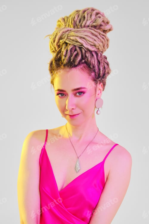 Preview: Portrait of woman in pink silk strap dress and bright violet makeup