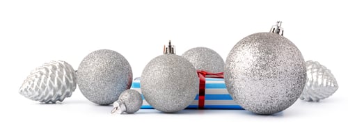 Preview: Christmas baubles and festive gift box isolated on white background