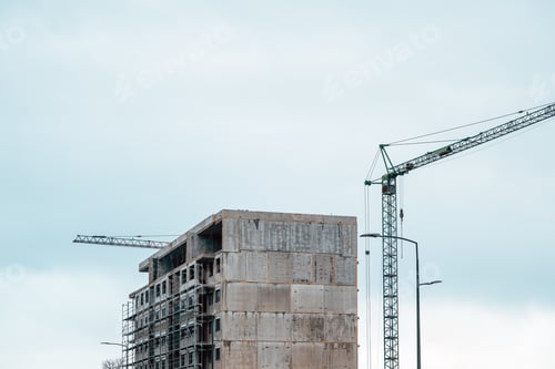 Preview: Prefabricated residential building construction site with old crane