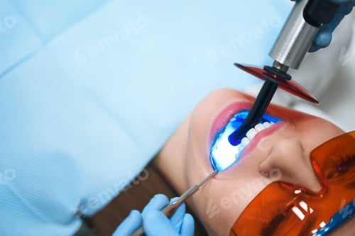 Preview: Young woman during teeth treatment stock photo