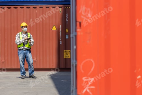 Preview: Foreman or worker work at Container cargo site check up goods in container.