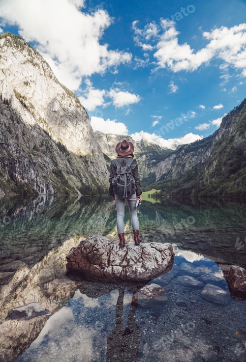 Preview: Young tourist with a backpack outdoors