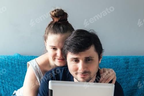 Preview: Happy Couple Relaxing Together at Home