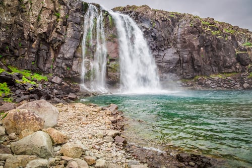 Preview: Small waterfall in Iceland in summer in cloudy day