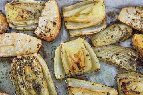 Preview: Stewed chicory on sheet in an electric stove after baking, according to recipe from the Internet.