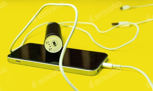 Preview: Power bank charging on yellow background
