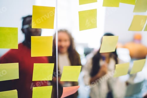 Preview: Glass with bright yellow paper stickers