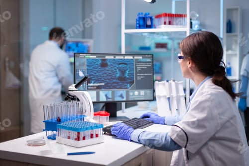 Preview: Science researcher in biochemist technology working in professional laboratory