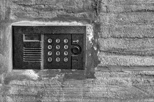 Preview: One Panel Of The Old On-Door Speakerphone On An Old Concrete Wall A Closeup Of Black-And-White Tone