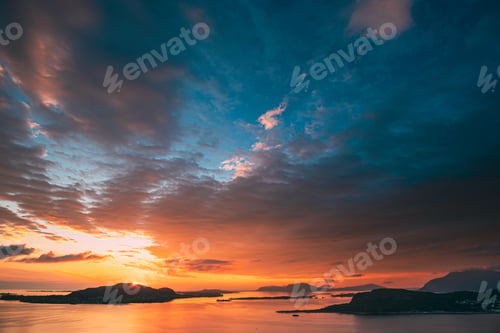 Preview: Alesund, Norway. Amazing Natural Bright Dramatic Sky In Warm Colours Above Alesund Valderoya And