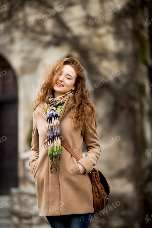Preview: Young red hair woman at outdoors