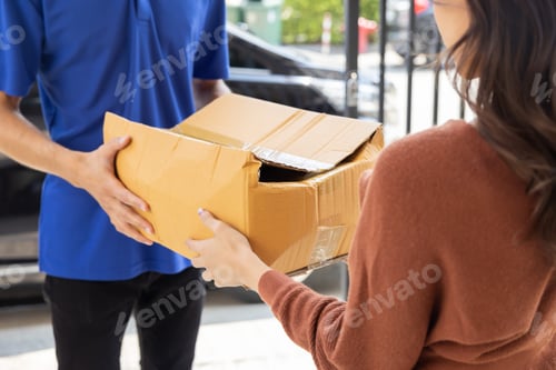 Preview: Delivery Man with Damaged Parcel Box Delivered to Customer