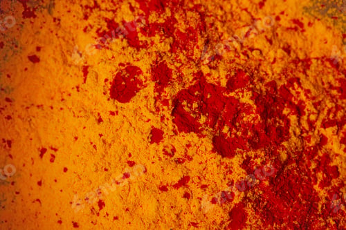 Preview: top view of orange and red holi powder, traditional Indian festival of colours
