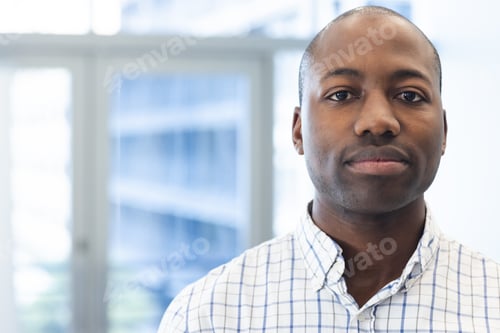 Preview: Portrait of african american man in hospital waiting room with copy space