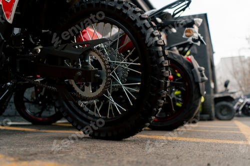 Preview: In a motorbike repair shop in the backyard there is a warehouse of motorbikes and tire variations