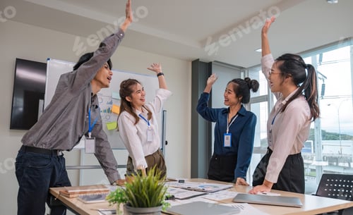 Preview: Group of Young Asian business team creative businesspeople coworker in office Happy to be successful