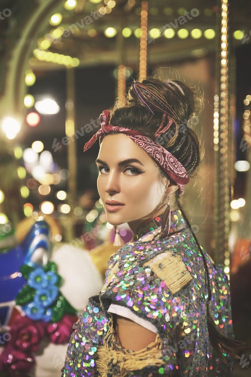 Preview: Stylish woman wearing sparkling jacket on the carousel
