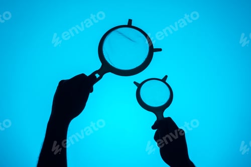 Preview: Two hands holding strainers of different sizes. Silhouette on a blue background
