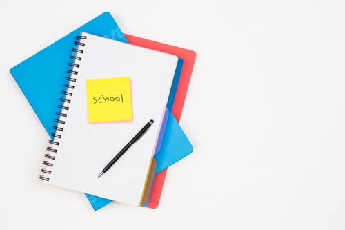 Preview: Notebooks, pen and paper reminder with the word school.