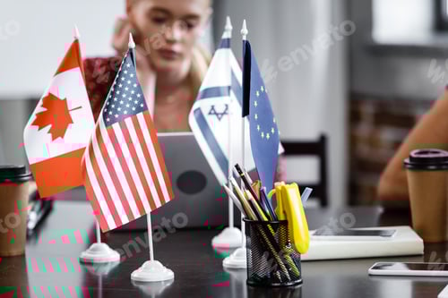 Preview: selective focus of flags of america, canada, european union and israel