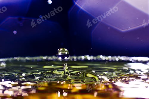 Preview: The water drop with interesting colorful blurred background