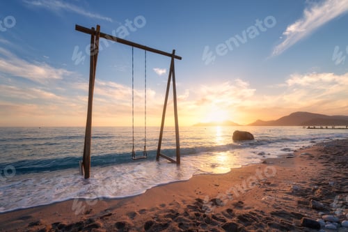 Preview: Wooden swing in beautiful blue sea with waves, sandy beach