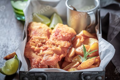 Preview: Delicious fries and cod served with lime and salt