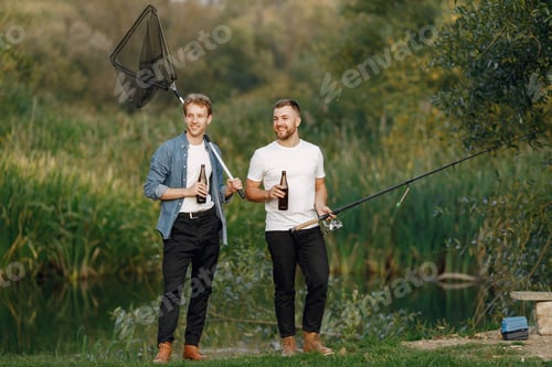Preview: Two men fishing near the river and drinking a beer