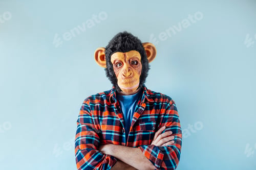Preview: Man in monkey mask gesturing.