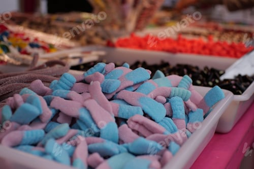 Preview: a sale of sweets leaves in tubs during a fun fair