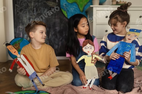 Preview: Little children playing with a handmade puppets.