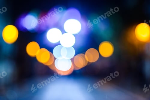 Preview: Defocused urban night background with colorful circles.