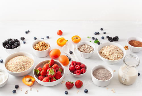 Preview: variaty of raw cereals, fruits and nuts for breakfast. Oatmeal f