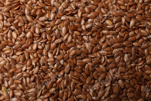 Preview: Many flax seeds as background, closeup view