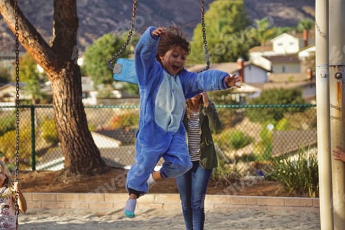 Preview: One of many childhood joys... jumping off of the swing!