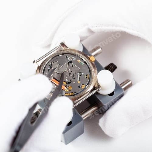 Preview: replacing battery in quartz wristwatch close up