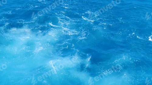 Preview: Turquoise ocean sea water white wave splashing deep blue sea. Bird eye view monster wave splash