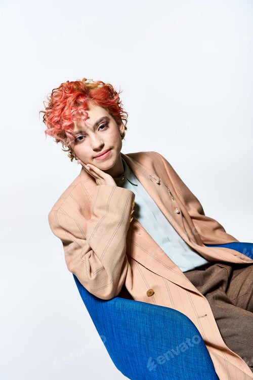 Preview: Ruby-haired Woman Relaxing on Azure Seat