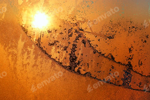 Preview: Beautiful ice pattern and sunlight on winter glass