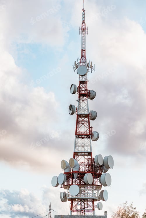 Preview: Telecommunication tower reaching for the cloudy sky in genoa, italy
