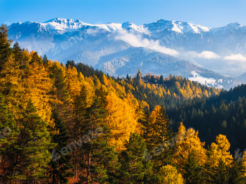 Preview: Aerial drone view of Bucegi Mountains in autumn season with blue sky
