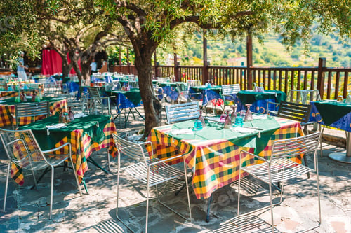 Preview: Summer empty outdoor cafe at tourist european city