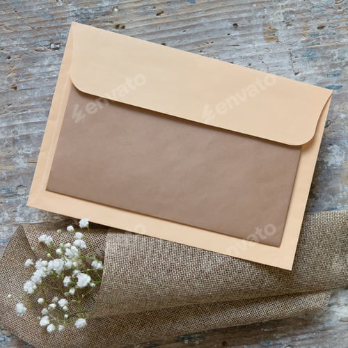 Preview: Blank greeting card, invitation and envelope mockup. Minimal floral frame made of flowers. Flat lay