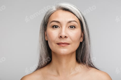 Preview: Beauty portrait of an attractive mature topless woman