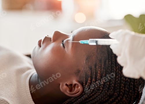 Preview: Face, needle and collagen, black woman at spa with injection for skincare and beauty treatment. Der