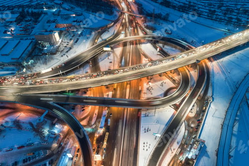 Preview: Aerial view of road in the modern city at night in winter